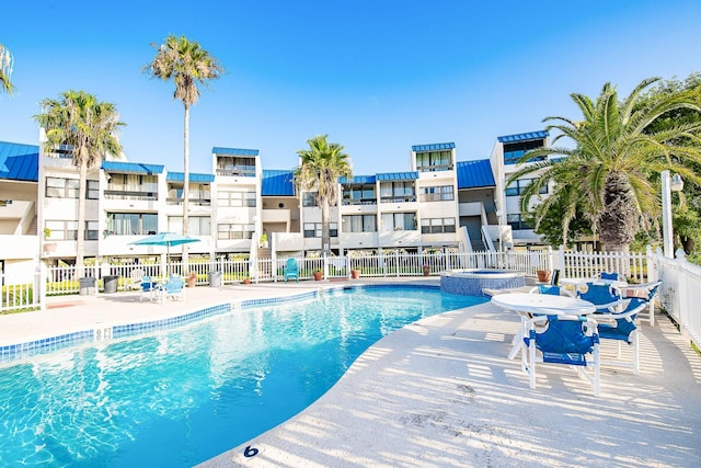 14401 Commodores Dr Unit 104, Corpus Christi, TX 78418 - community pool with a patio area