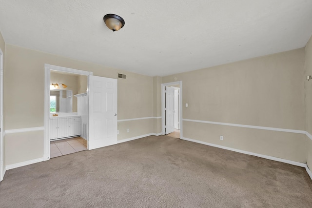 3519 El James Dr, Spring, TX 77388 - unfurnished bedroom with carpet flooring and ensuite bath
