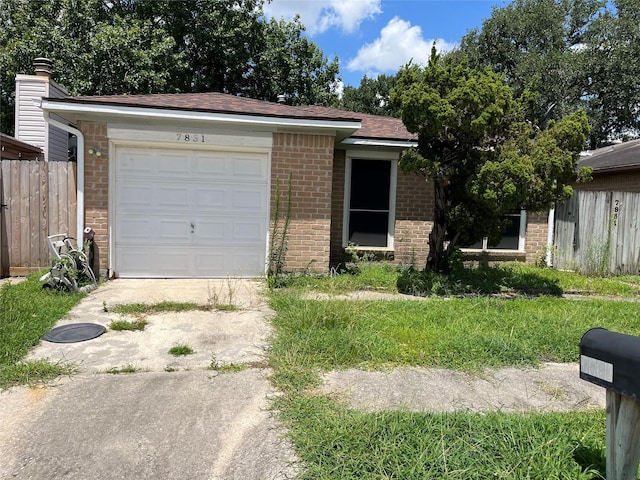 7831 Terra Cotta Dr, Houston, TX 77040 - single story home with brick siding, concrete driveway, and an attached garage