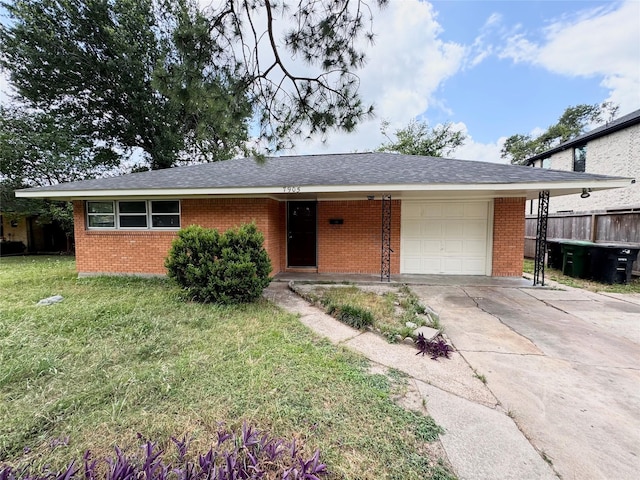 7905 Turquoise Ln, Houston, TX 77055 - ranch-style house featuring brick siding, a garage, and concrete driveway