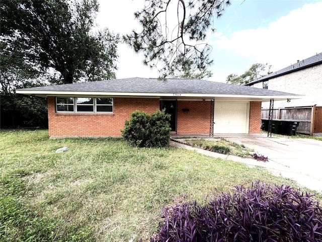 7905 Turquoise Ln, Houston, TX 77055 - ranch-style home with brick siding, a garage, and driveway