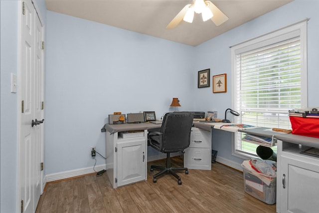 80 Indian Hbr, Trinity, TX 75862 - office area featuring light wood-style floors, a ceiling fan, and healthy amount of natural light