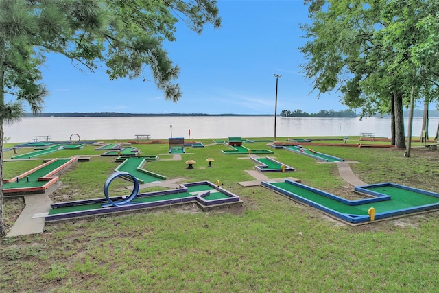 80 Indian Hbr, Trinity, TX 75862 - view of property's community with a water view, an area to practice putting, and a lawn