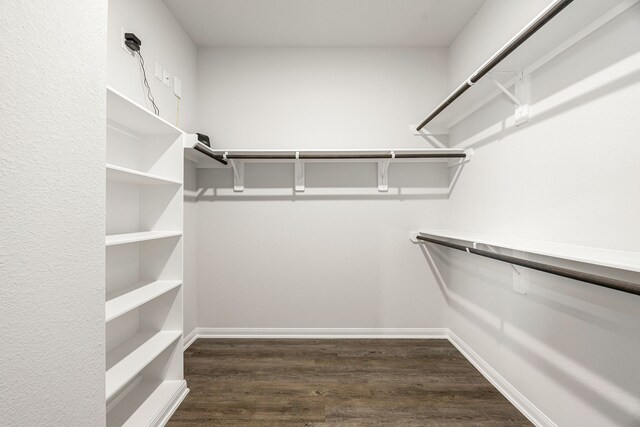 11323 Cora Ln, Willis, TX 77318 - spacious closet with dark wood-style floors