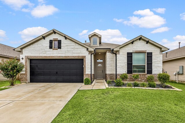 11323 Cora Ln, Willis, TX 77318 - view of front facade featuring concrete driveway, brick siding, a front lawn, and stone siding