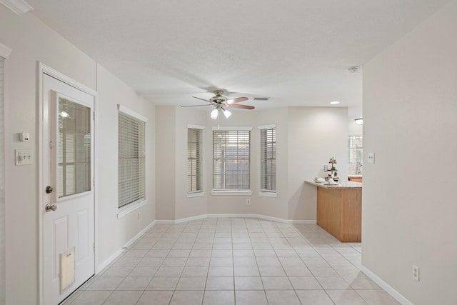 8602 Canyon Pine Dr, Spring, TX 77379 - empty room featuring ceiling fan and light tile patterned floors