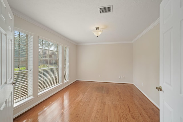 8602 Canyon Pine Dr, Spring, TX 77379 - unfurnished room featuring light wood finished floors and crown molding