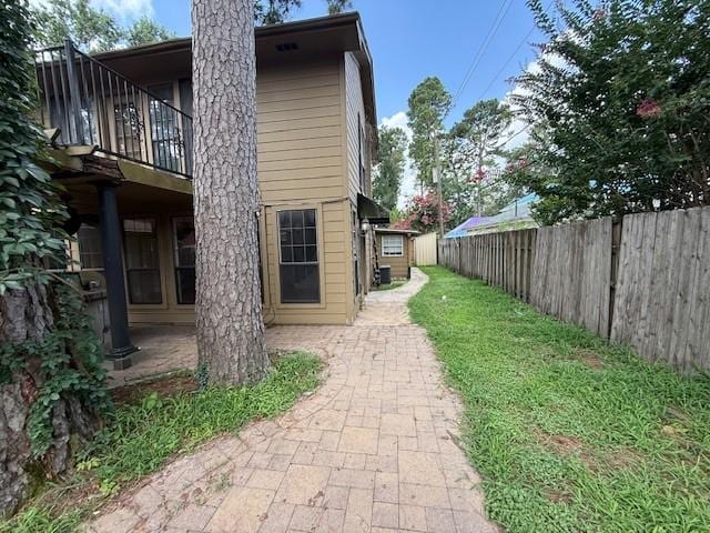 5914 Foresthaven Dr, Houston, TX 77066 - back of property with a fenced backyard and a patio area