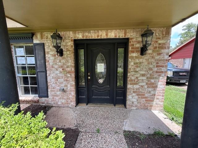 5914 Foresthaven Dr, Houston, TX 77066 - entrance to property with brick siding