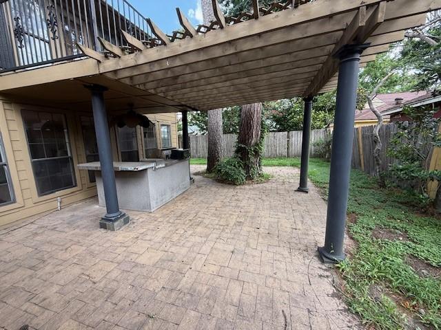 5914 Foresthaven Dr, Houston, TX 77066 - fenced backyard featuring a patio area and a pergola