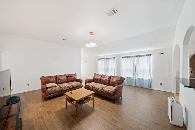 10919 Barker View Dr, Cypress, TX 77433 - living room with wood finished floors and arched walkways