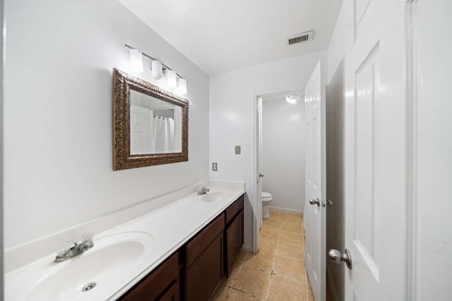 10919 Barker View Dr, Cypress, TX 77433 - full bath with double vanity and toilet