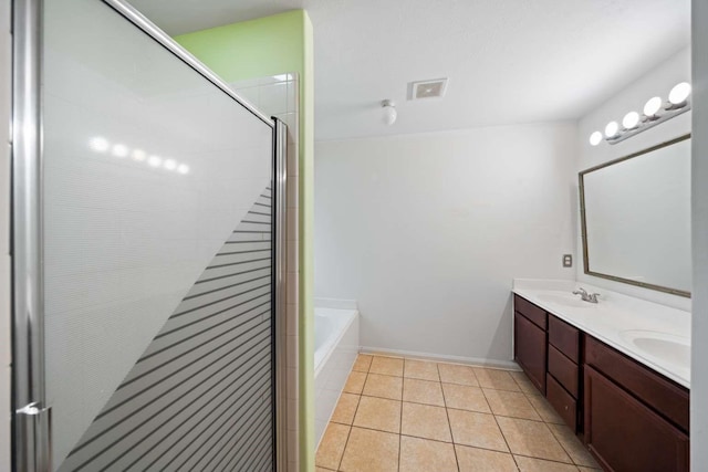 10919 Barker View Dr, Cypress, TX 77433 - bathroom featuring double vanity, a shower stall, a bath, and tile patterned floors
