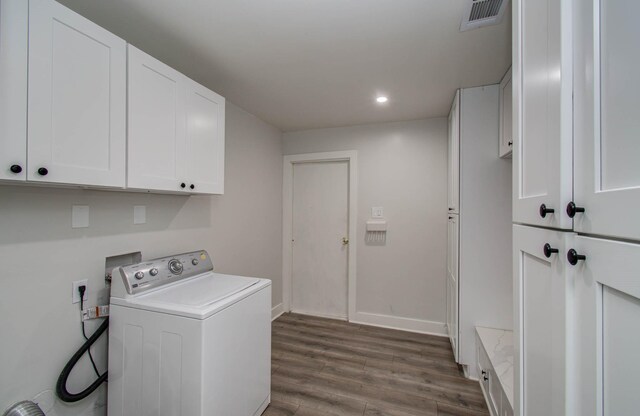 10415 Westray St, Houston, TX 77043 - laundry room with washer / clothes dryer, cabinet space, dark wood-style floors, and recessed lighting