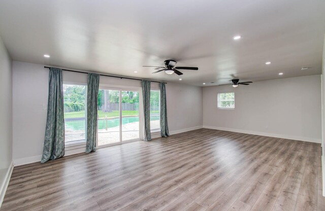 10415 Westray St, Houston, TX 77043 - unfurnished room with recessed lighting, light wood-style floors, and ceiling fan