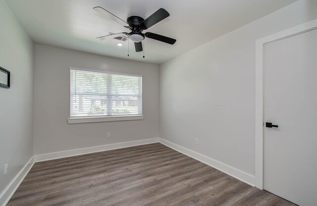 10415 Westray St, Houston, TX 77043 - unfurnished room with wood finished floors and a ceiling fan