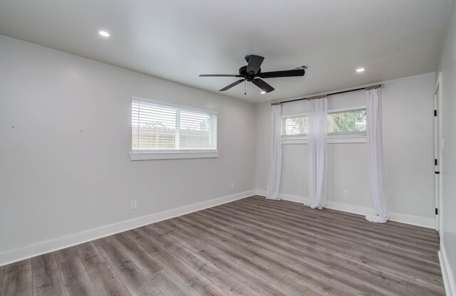 10415 Westray St, Houston, TX 77043 - unfurnished room featuring wood finished floors, ceiling fan, and recessed lighting