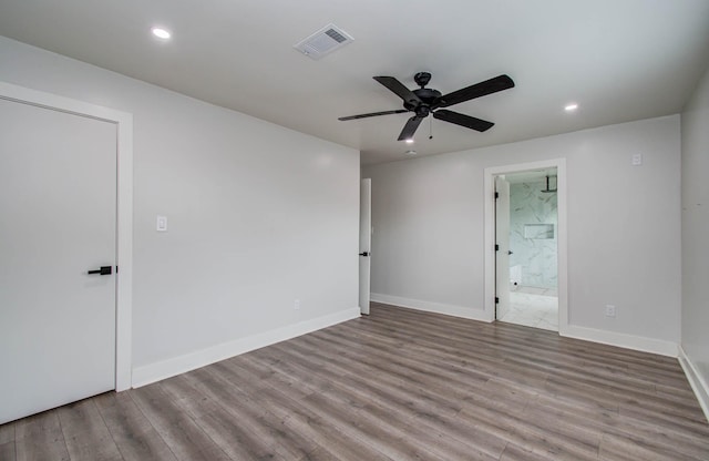 10415 Westray St, Houston, TX 77043 - empty room featuring recessed lighting, wood finished floors, and a ceiling fan