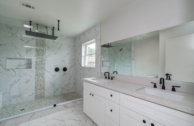 10415 Westray St, Houston, TX 77043 - bathroom featuring marble finish flooring, a marble finish shower, and double vanity