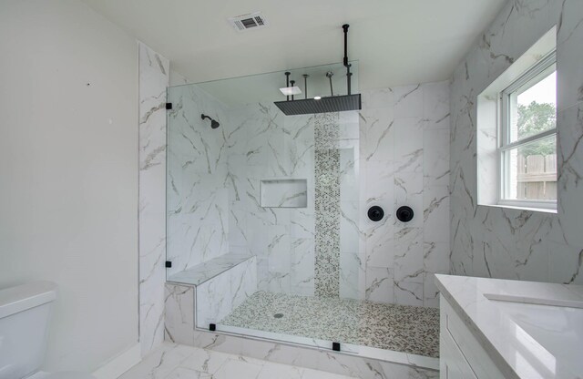 10415 Westray St, Houston, TX 77043 - full bath with a marble finish shower, vanity, and marble finish floors