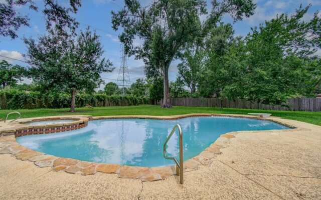 10415 Westray St, Houston, TX 77043 - view of swimming pool with a fenced backyard, a patio area, and a pool with connected hot tub
