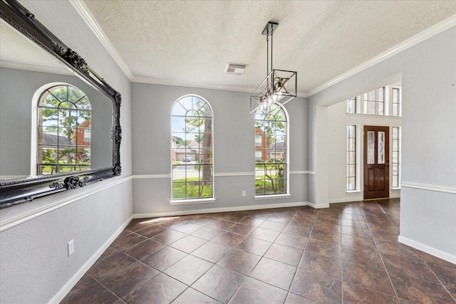 12823 Birch Falls Rd, Houston, TX 77065 - unfurnished dining area with plenty of natural light, ornamental molding, a textured ceiling, a chandelier, and tile patterned floors