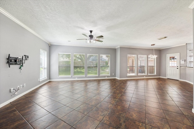 12823 Birch Falls Rd, Houston, TX 77065 - unfurnished living room with plenty of natural light, dark tile patterned flooring, ceiling fan, crown molding, and a textured ceiling