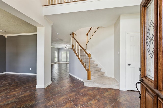 12823 Birch Falls Rd, Houston, TX 77065 - entrance foyer with stairway, ornamental molding, and recessed lighting
