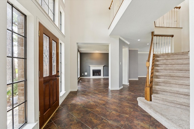 12823 Birch Falls Rd, Houston, TX 77065 - entryway with ornamental molding, plenty of natural light, stairway, a high ceiling, and recessed lighting