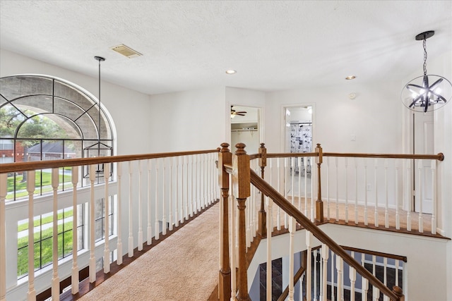 12823 Birch Falls Rd, Houston, TX 77065 - hall featuring an upstairs landing, a chandelier, recessed lighting, and a textured ceiling