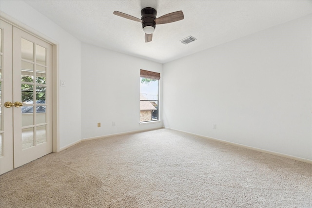 12823 Birch Falls Rd, Houston, TX 77065 - carpeted empty room with french doors and ceiling fan