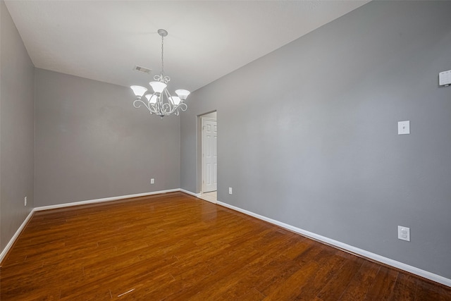 5403 Round Hollow Ct, Katy, TX 77494 - unfurnished room featuring wood finished floors and a chandelier