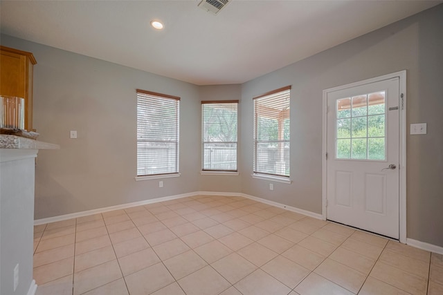 5403 Round Hollow Ct, Katy, TX 77494 - unfurnished dining area with light tile patterned floors and recessed lighting