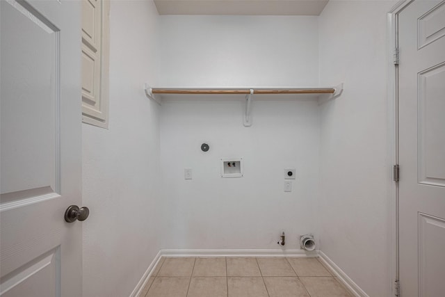 5403 Round Hollow Ct, Katy, TX 77494 - laundry room with gas dryer hookup, electric dryer hookup, light tile patterned floors, and hookup for a washing machine