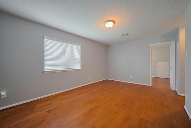 5403 Round Hollow Ct, Katy, TX 77494 - empty room featuring hardwood / wood-style floors and baseboards