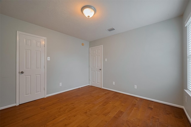 5403 Round Hollow Ct, Katy, TX 77494 - spare room with light wood finished floors and baseboards