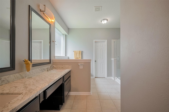5403 Round Hollow Ct, Katy, TX 77494 - full bathroom with double vanity, tile patterned flooring, and a walk in shower