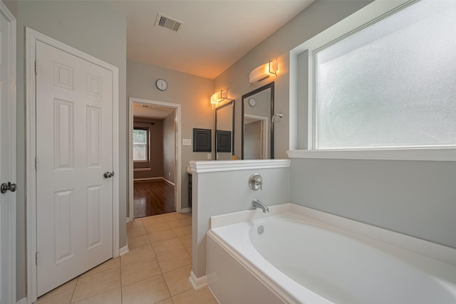 5403 Round Hollow Ct, Katy, TX 77494 - full bath with a garden tub and tile patterned floors