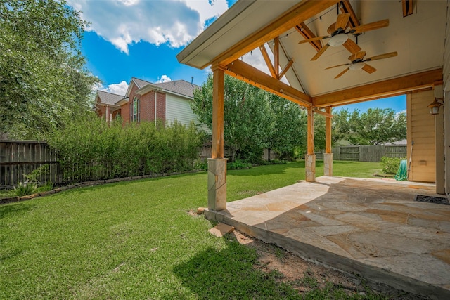 5403 Round Hollow Ct, Katy, TX 77494 - fenced backyard featuring ceiling fan and a patio