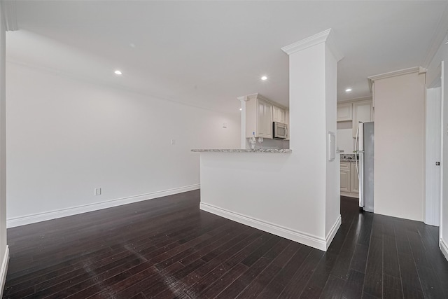2333 Bering Dr Unit 334, Houston, TX 77057 - unfurnished living room featuring dark wood-style floors and recessed lighting