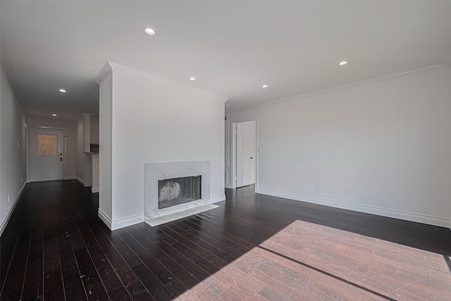 2333 Bering Dr Unit 334, Houston, TX 77057 - living area with ornamental molding, wood-type flooring, a high end fireplace, and recessed lighting