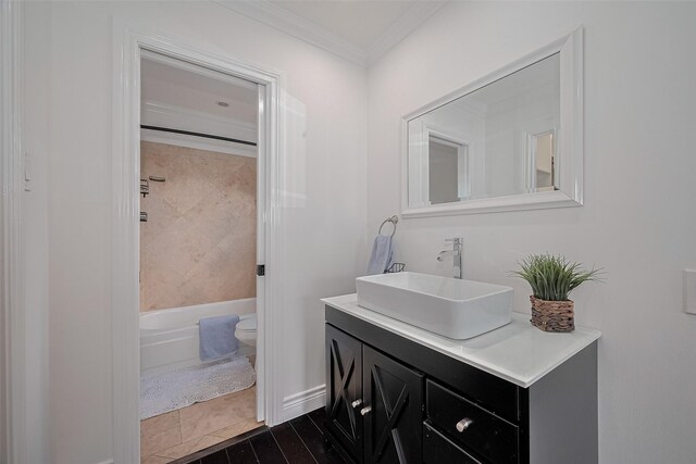 2333 Bering Dr Unit 334, Houston, TX 77057 - bathroom with vanity, crown molding, and wood finished floors