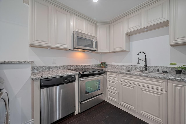 2333 Bering Dr Unit 334, Houston, TX 77057 - kitchen with stainless steel appliances, white cabinets, dark wood-type flooring, and light stone countertops