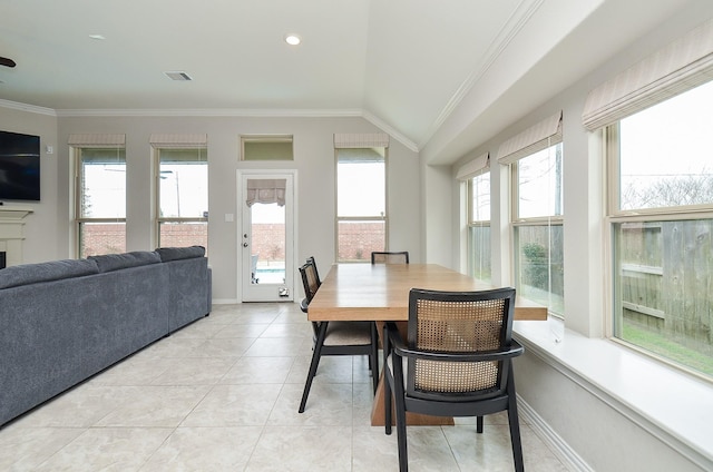 23334 Peareson Bend Ln, Richmond, TX 77469 - dining room featuring ornamental molding, lofted ceiling, and light tile patterned floors