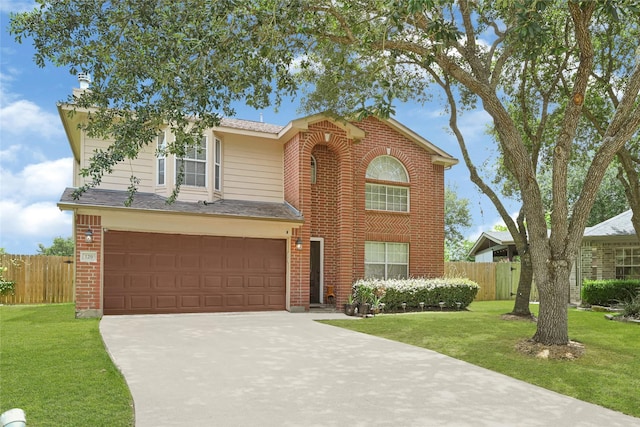 129 Breezy Shore Ct, Dickinson, TX 77539 - traditional-style home featuring driveway, an attached garage, and brick siding