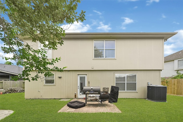 129 Breezy Shore Ct, Dickinson, TX 77539 - back of house featuring a patio area