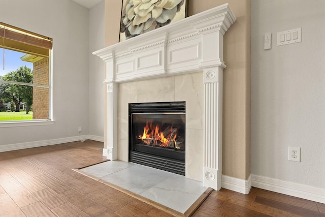4946 Westchester Dr, Fulshear, TX 77441 - detailed view of a tiled fireplace and wood finished floors