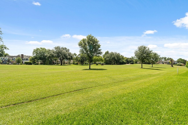 4946 Westchester Dr, Fulshear, TX 77441 - view of home's community featuring a lawn