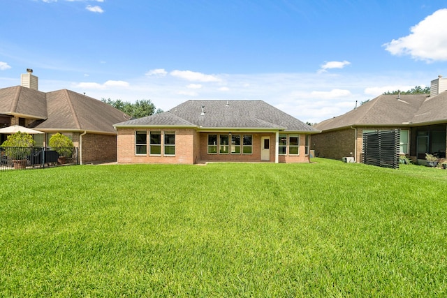 4946 Westchester Dr, Fulshear, TX 77441 - rear view of house with brick siding