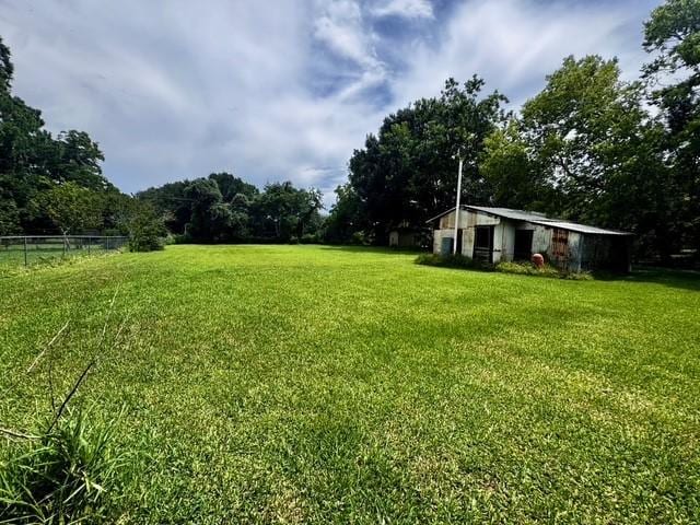 2803 Horn Rd, Bay City, TX 77414 - view of yard featuring an outbuilding and a pole building